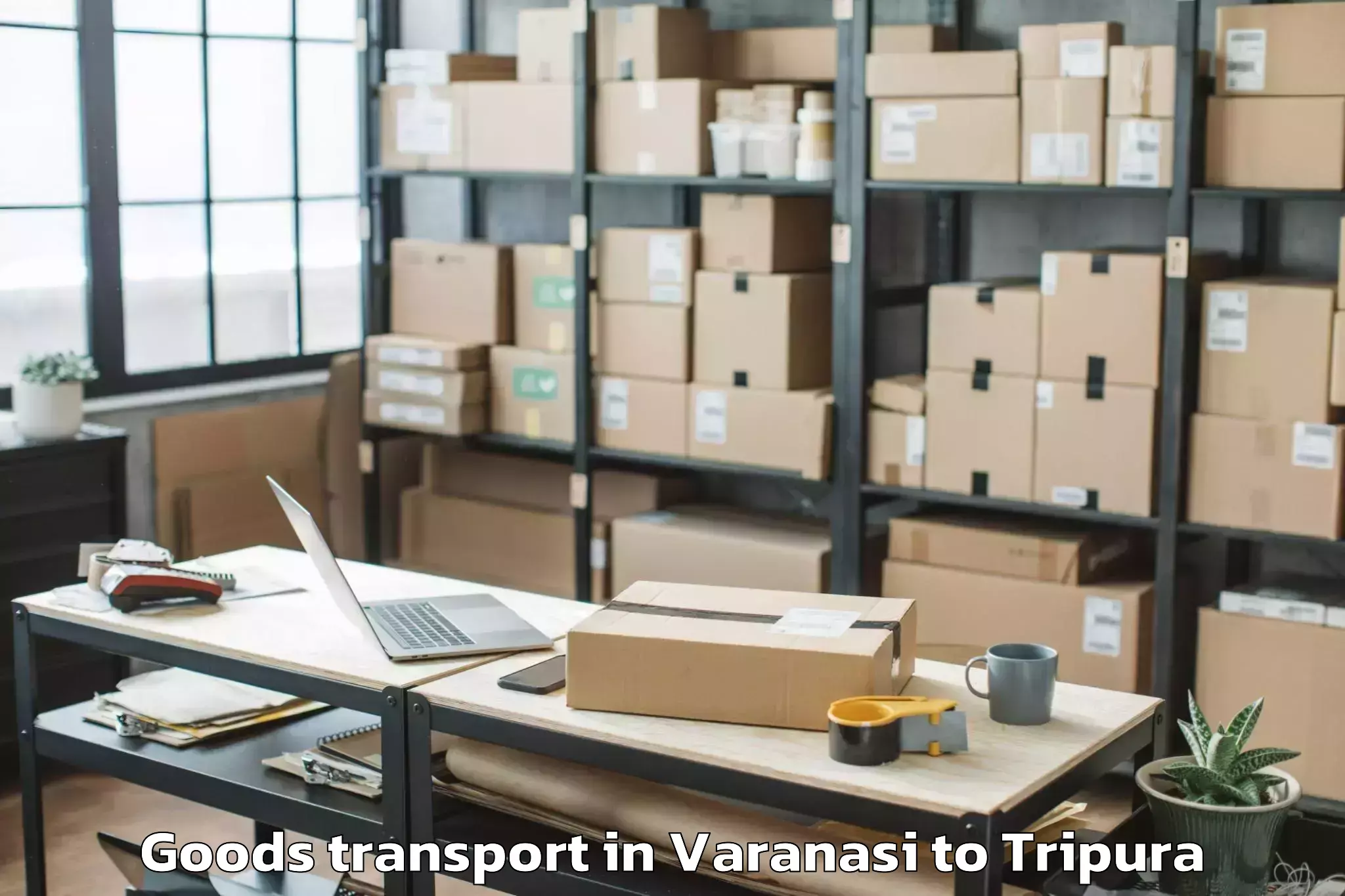 Get Varanasi to Manughat Goods Transport